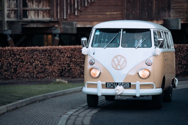 Arriving for wedding in a VW Campervan at Alnwick Treehouse