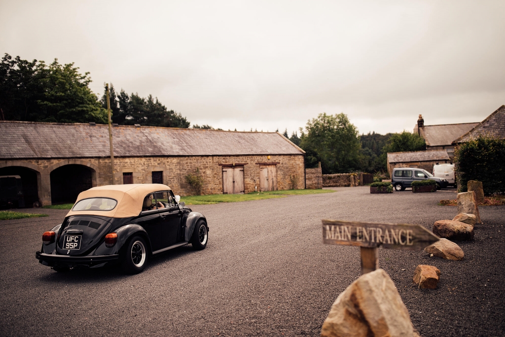 VW Beetle makes an entrance at Healey Barn, Riding Mill